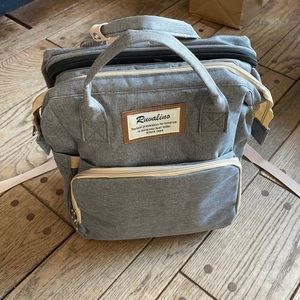 Never used diaper bag backpack. BRAND NEW